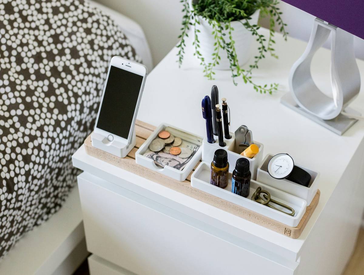 Side-by-side comparison: chaotic makeup drawer vs. clean acrylic makeup organizer stand with labeled compartments