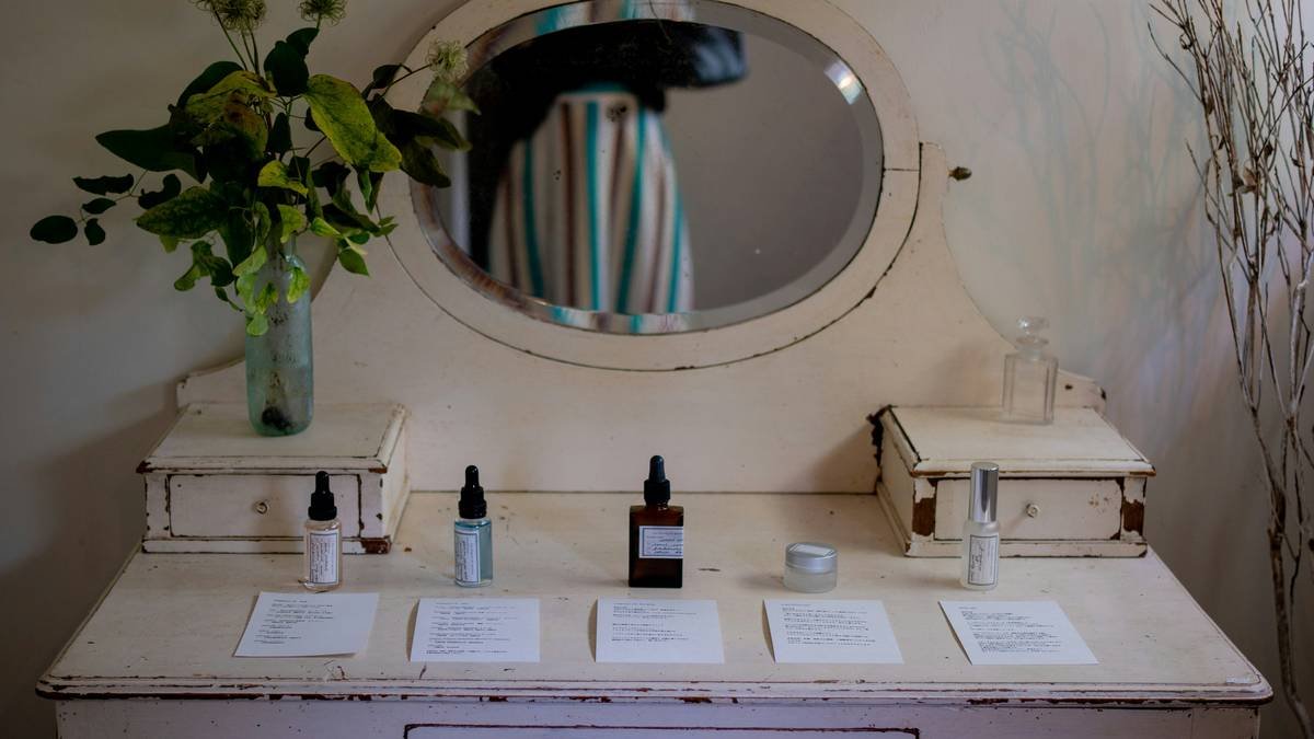 Side-by-side comparison: cluttered makeup drawer vs. organized acrylic beauty storage rack with labeled sections for brushes, palettes, and skincare