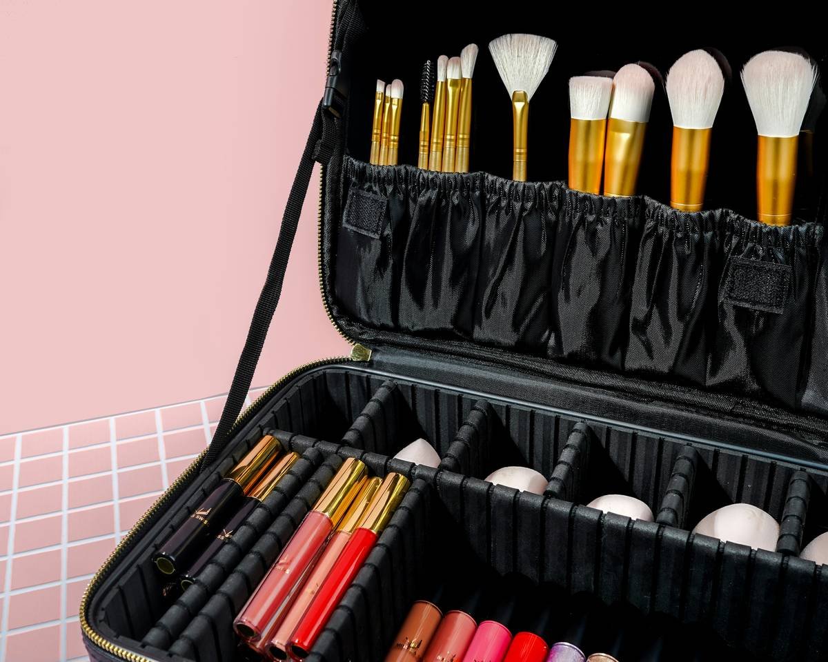 Side-by-side comparison: cluttered makeup drawer vs. organized acrylic makeup storage unit with labeled compartments